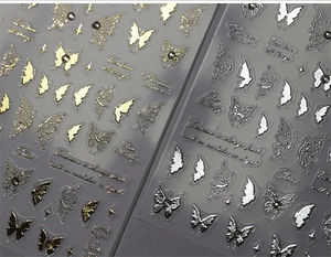 Detailed 3D embossed butterfly and script nail art stickers in gold and silver finish