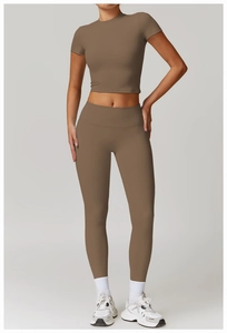 Mocha brown yoga set with short sleeve crop top and high waist leggings in matte fabric