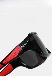 Detail of polarized sports sunglasses showing red honeycomb rubber pads on black temples