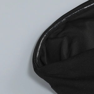 Detail view of the non-slip silicone strip on the black tube top dress inner edge
