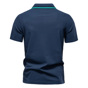 Detailed back view of navy polo shirt featuring striped collar and pique fabric texture
