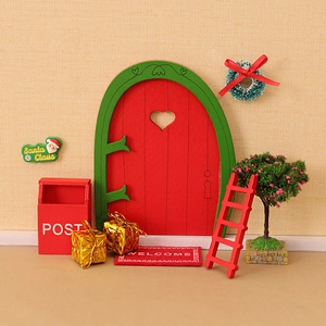 Miniature wooden Christmas elf door set with red mailbox and welcome mat decor