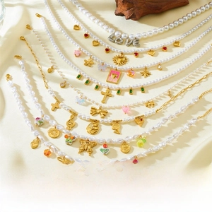 Retro multi-element necklaces with heart, bow, and cross charms on vintage pearls