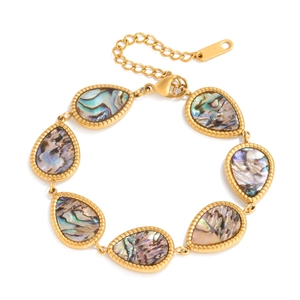 Detailed shot of 18K gold plated bracelet with teardrop-shaped abalone shell inlays