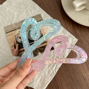 Iridescent mermaid heart hair claw clips in blue and pink for elegant women