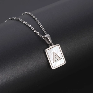 Silver stainless steel necklace with rectangular shell pendant featuring letter A
