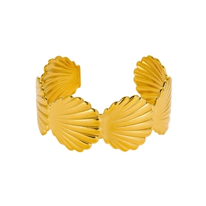 Elegant gold open cuff bracelet featuring a continuous scalloped shell textured design