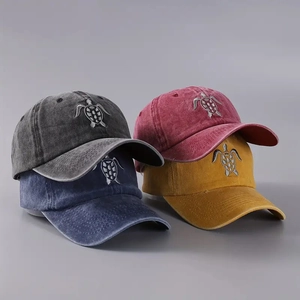 Set of four washed cotton baseball caps with turtle embroidery in vintage colors