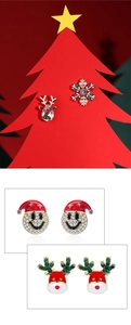 Detailed close-up of Christmas snowflake and reindeer studs with vibrant enamel finish