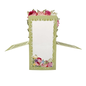 Detailed view of 3D popup floral greeting card with green frame and central writing area