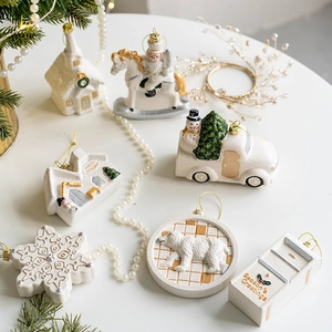 White Christmas ornaments set including church and soldier icons on pine branches