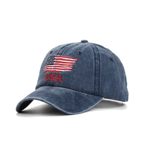 Detailed embroidery of USA text and American flag on navy washed cotton baseball cap