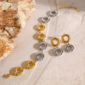 Modern 18k gold and silver two-tone interlocked circle pendant earrings and bracelet set