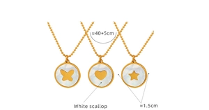 Detailed view of heart, butterfly, and star pendants with white scallop inlays on gold chains