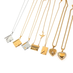 Collection of stainless steel heart lockets, envelope and bird pendant necklaces