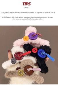 Detail showing plush hair claw clips with buttons and woven pulls in assorted colors