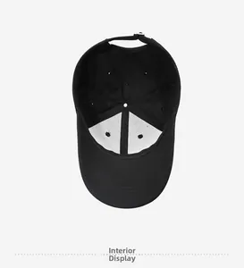 Interior view showing the reinforced lining and 6-panel structure of the black cotton baseball cap
