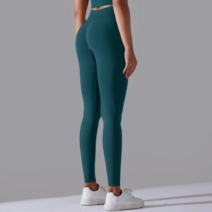 Detailansicht der teal-nahtlosen Yogahose mit hoher Taille und Push-up Effekt am Gesäß