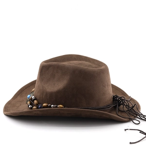 Detail of western brown suede cowboy hat with turquoise beads and woven headband