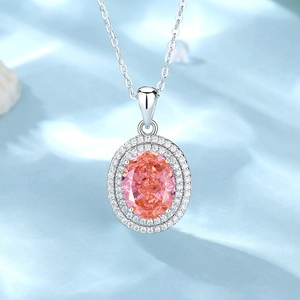 S925 sterling silver necklace featuring an oval pink pendant with a halo of white stones