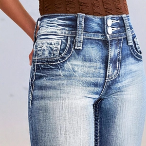 Women's blue high-waist stretch denim jeans with double button fly and washed details