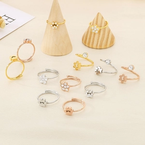 Minimalist cat paw and flower rings in gold, silver, and rose gold with zircon stones