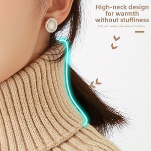 Close-up of beige knitted faux collar neck warmer with detailed vertical rib texture