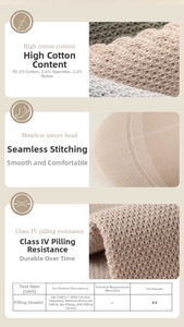 Close-up of beige cotton socks showing rib knit texture and seamless toe stitching