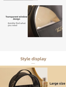 Detail view of large black travel toiletry bag with transparent window and gold zipper