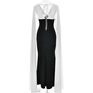 Detail of elegant back tie and white cape sleeves on a slim V-neck evening gown