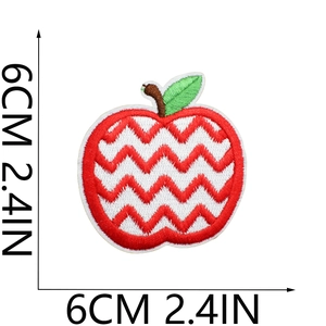 Detailed view of apple shape embroidery patch with 6cm measurement for garment decor