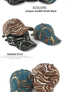 Detailed view of three graffiti baseball caps with marble patterns in diverse colorways