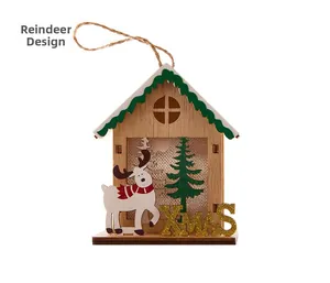 Macro view of wooden Christmas house hanging ornament with reindeer and gold XMAS glitter