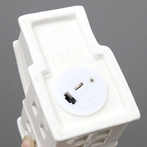 Nordic white ceramic house decoration with bottom LED battery compartment and switch