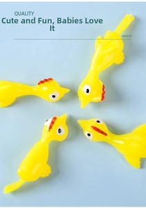 Close-up of four yellow TPR slingshot chicken toys showing soft texture and elasticity