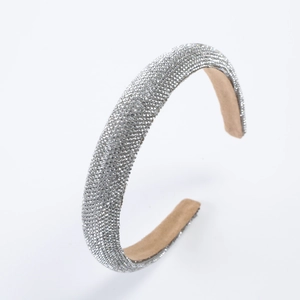 Sparkling silver headband with dense rhinestones and a padded non-slip velvet lining
