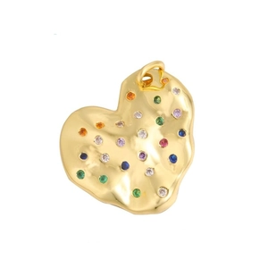 Detailed view of a gold heart pendant with colorful zircon stones and hammered texture