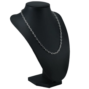 Macro view of silver stainless steel embossed O-chain on a black mannequin display
