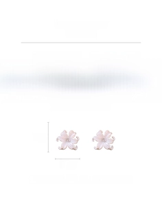 Detailed view of large acrylic flower earrings with zircon center and silver needles