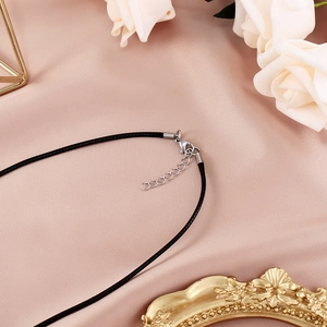 Detail of adjustable black wax rope necklace chain with silver lobster clasp and extension
