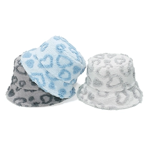 Winter faux fur bucket hat with leopard print pattern in blue, gray, and white colors