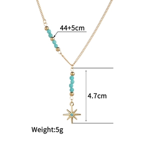 Detailed view of sun pendant necklace with 44+5cm chain length and 5g weight specs