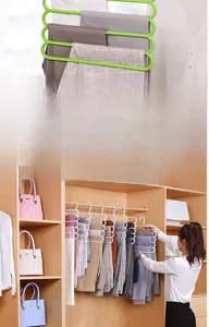 Close-up of multi-layer S-shaped closet organizer for hanging pants and scarves