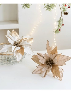 Detailed view of bicolor 27cm glitter velvet poinsettia on festive decorated pine branch