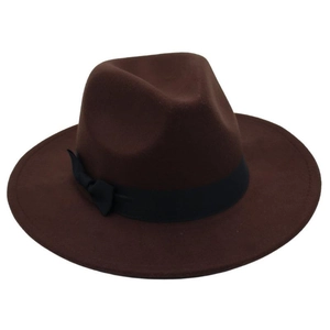 Detailed texture of dark brown wool fedora hat with elegant black silk bow ribbon