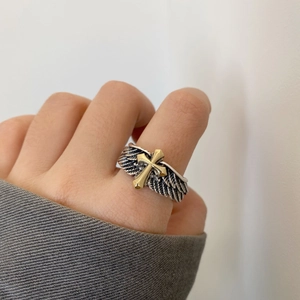 Retro angel wing cross open ring with graffiti letters and vintage metallic finish