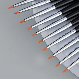Set of 11 professional precision eyeliner brushes with orange bristles and black handles