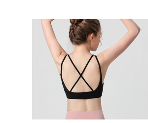 Detail of black sports bra featuring criss-cross back straps and elastic breathable fabric