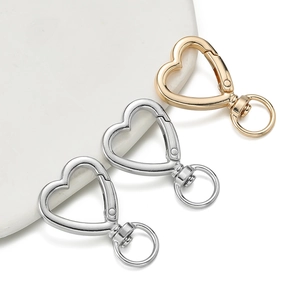 Polished heart-shaped lobster clasps in gold and silver with 360-degree rotating rings