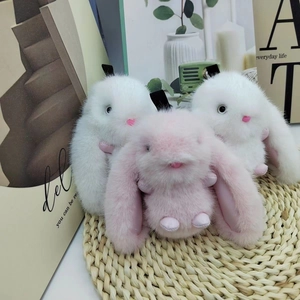 Plush long-eared rabbit keychains in white and pink faux mink fur for bags